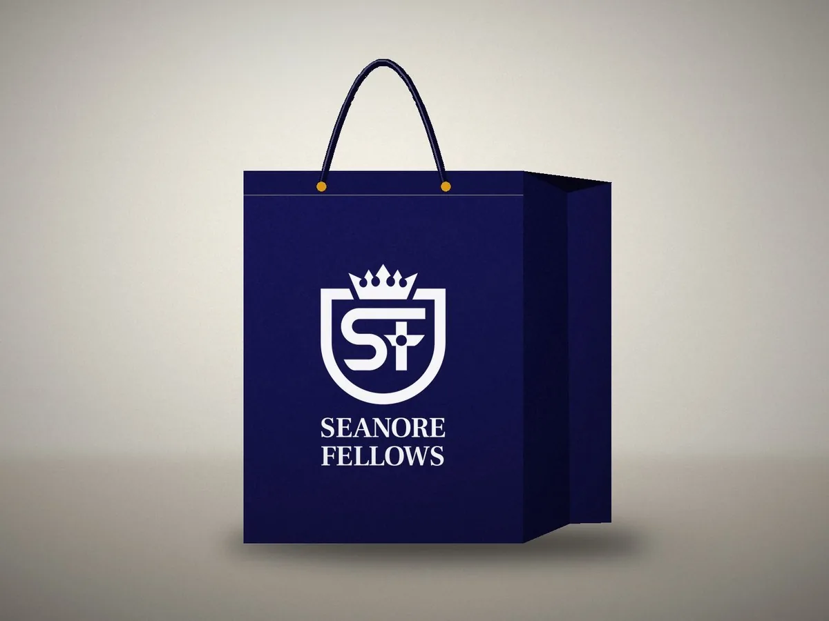 Navy shopping bag printed with the white signature crest