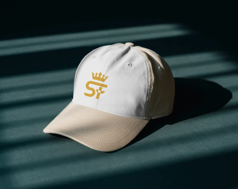 Cream cap with the crowned SF monogram on the front panel